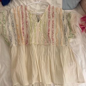 Cute cream colorful top